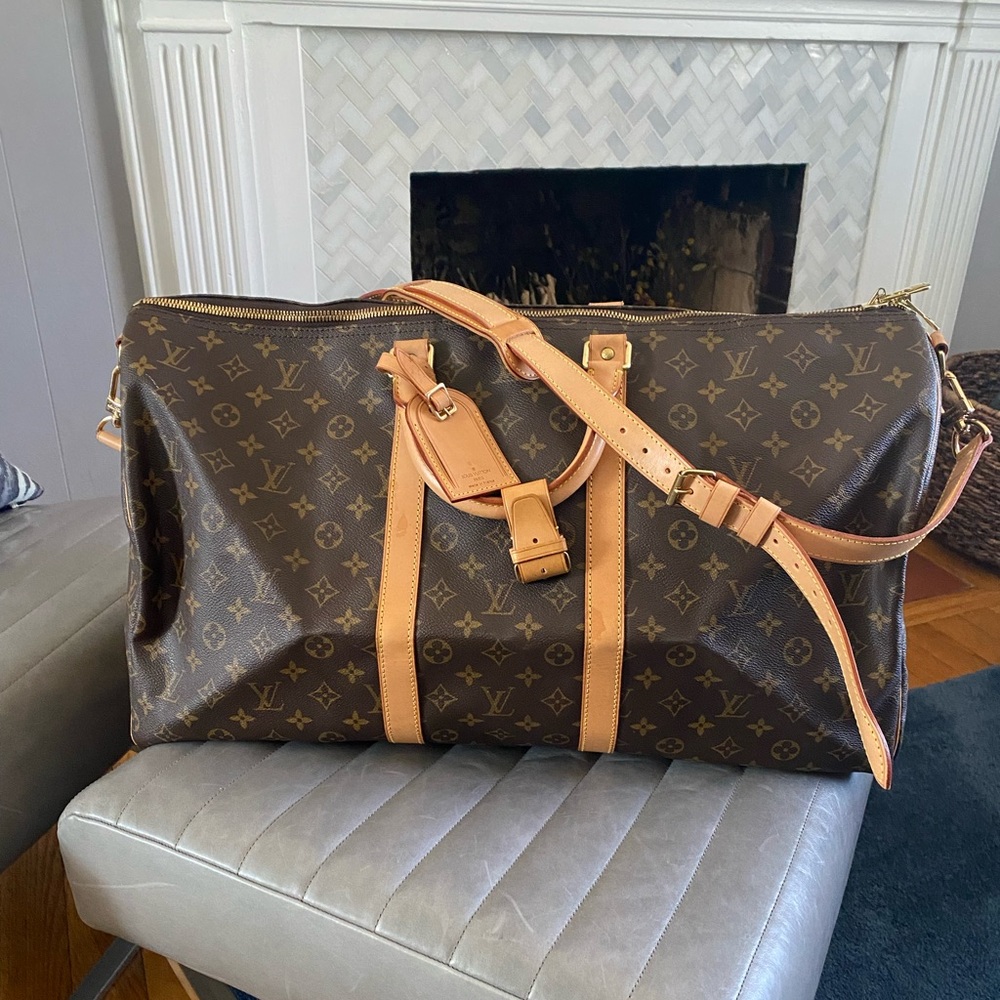 Authentic Louis Vuitton Keepall 55 Bandouliere NEW, NEVER USED and AUTHENTIC!!